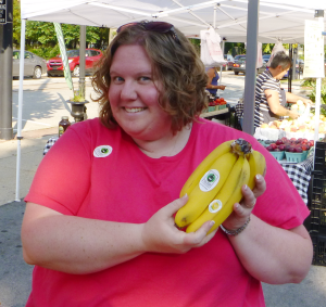 Emily dishin' out Fair Trade Bananas at the Media, PA Farmers' Market!